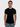 Man wearing a black t-shirt against a plain background